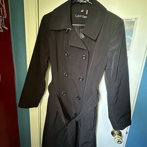 Calvin Klein woman’s black trench coach.